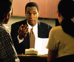 Lawyer advising clients