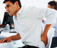 Young man with back injuries